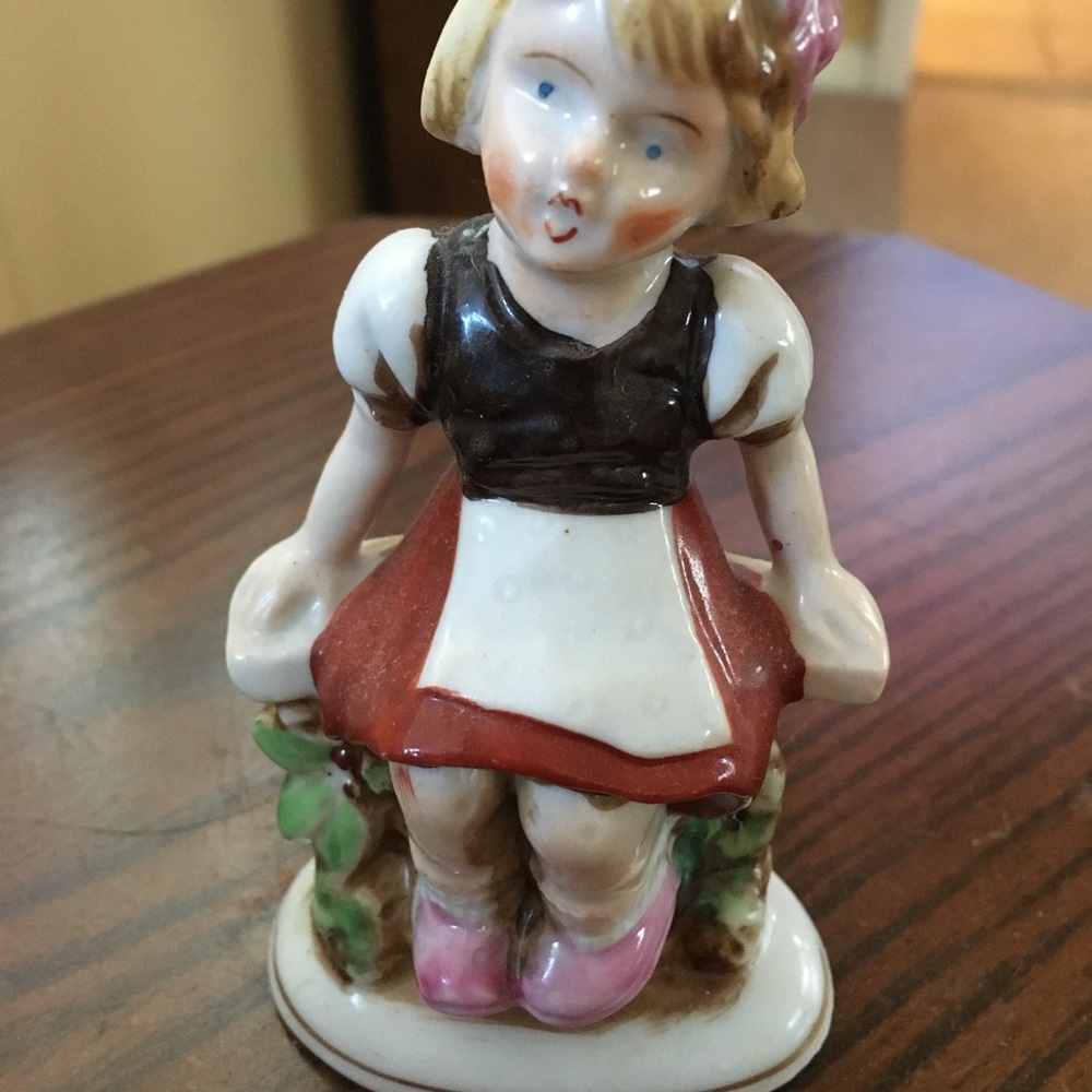 Porcelain Girl Sitting on a Fence Vintage